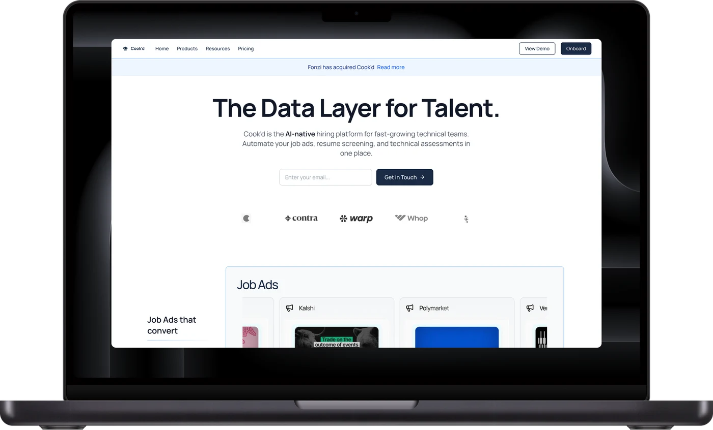 Cook`d landing page on a MacBook