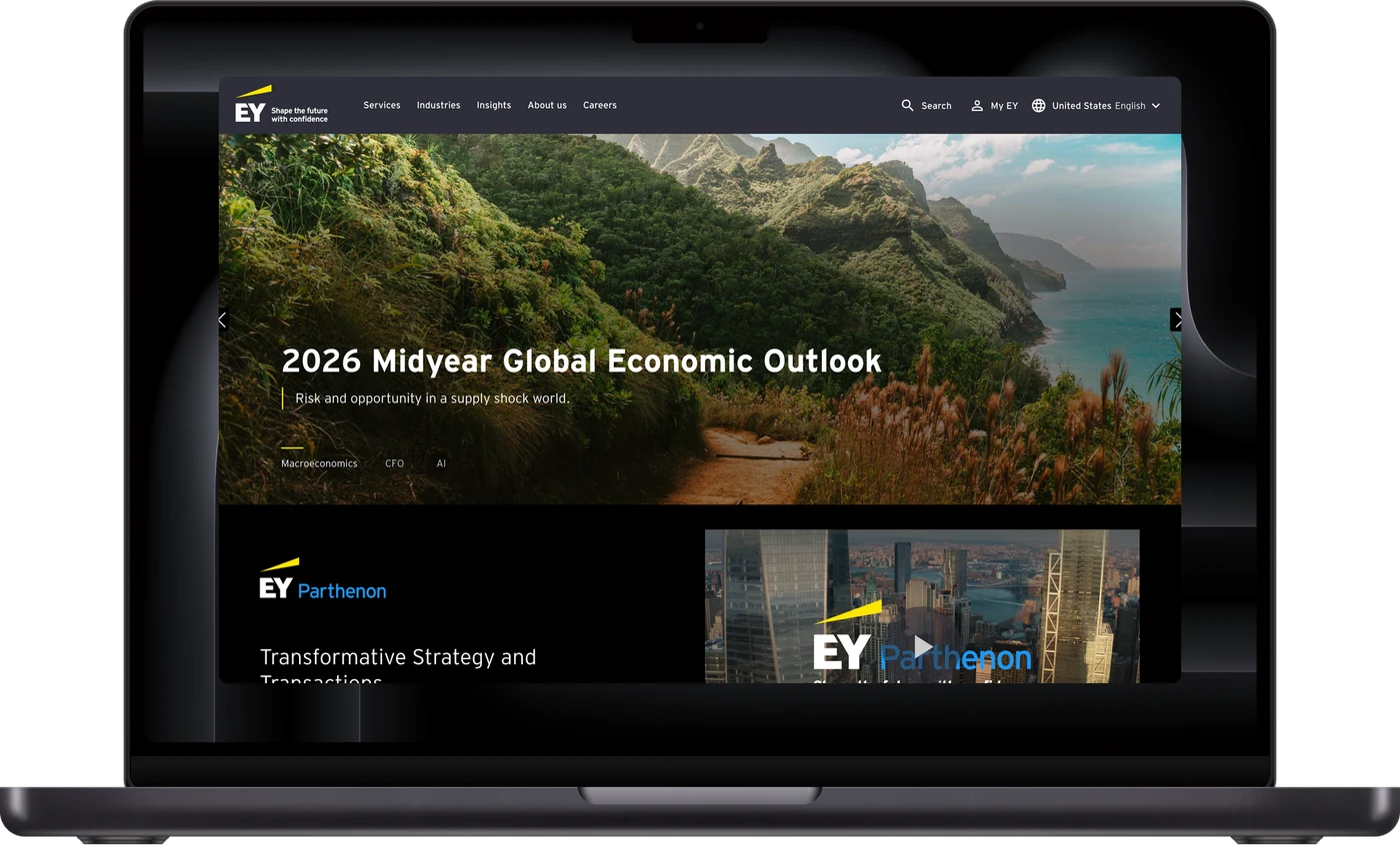 Ernst & Young landing page on a MacBook