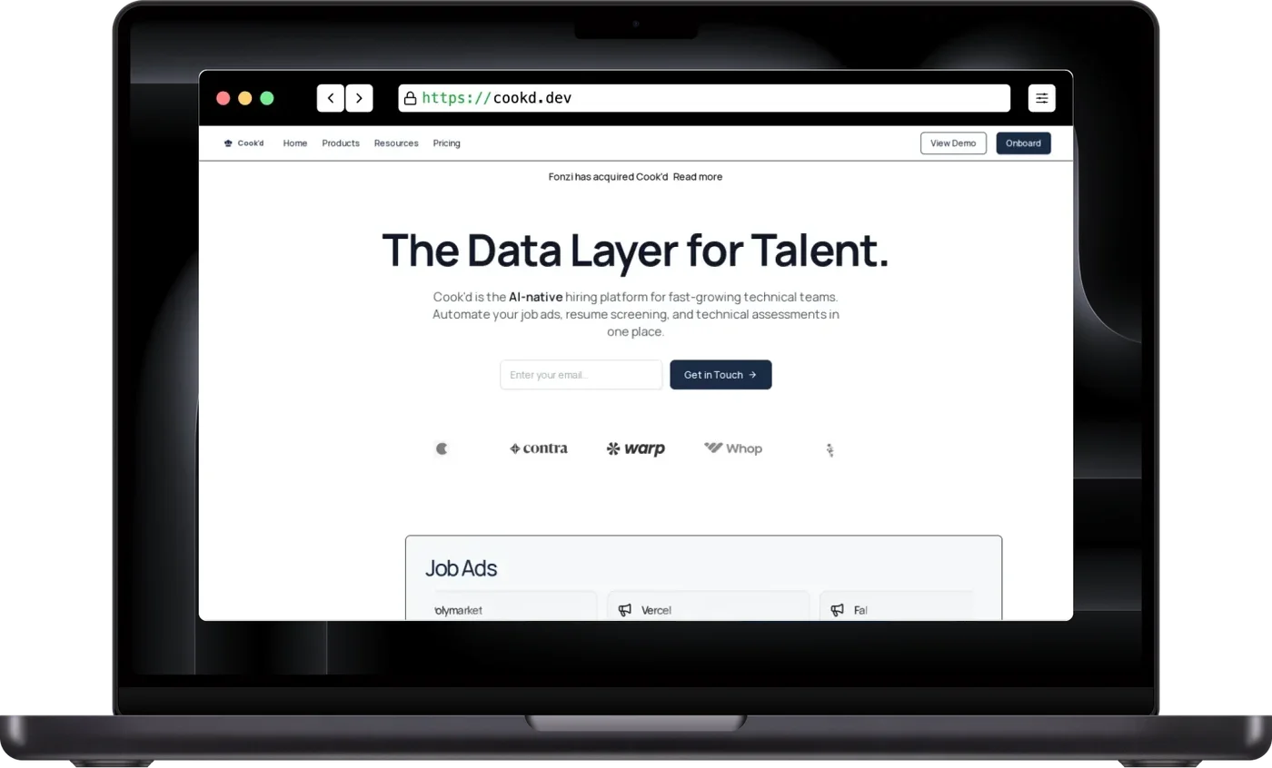 Cook`d landing page on a MacBook